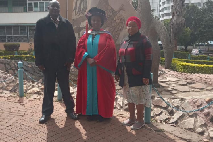 Prof. Jakinda with his PhD student Annette Goodluck and her mother
