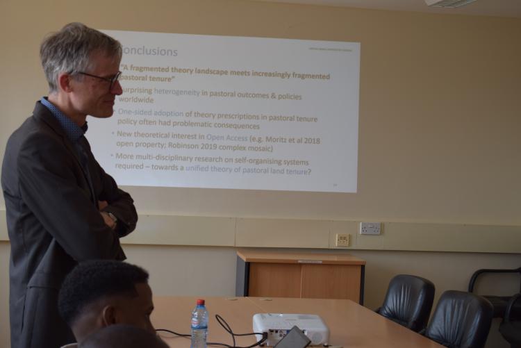 Prof Petrick listening keenly to a participant's response