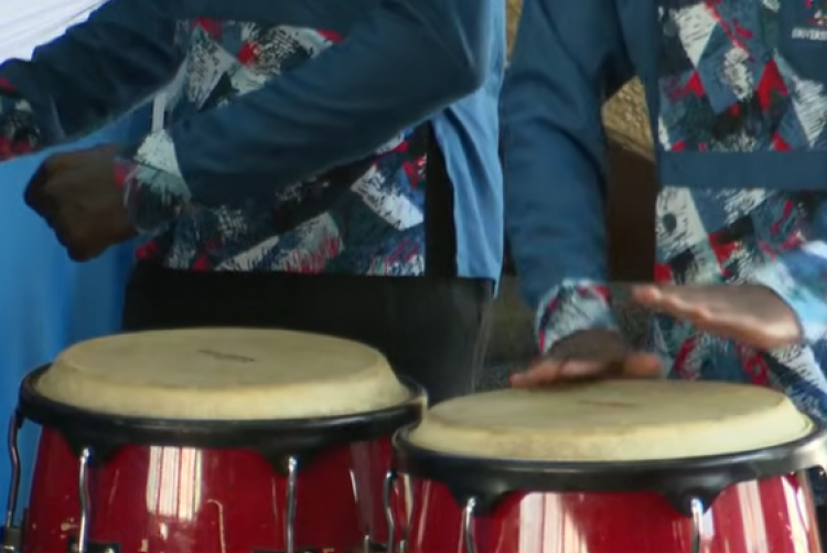 University Choir Playing the Drums