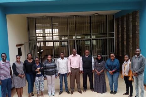 A Visit to the Department of Agricultural Economics by Dr. Paul Demo (5th from the right) - Director of the International Potato Center (CIP), Sub-Saharan Africa. The acting Chairman of the Department - (6th from the right) and postgraduate students in attendance.