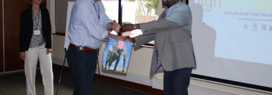 The AgriFoSe Project Partners (Prof. Magnus Jistrom and Prof. Sofia Boqvist) being presented with gifts from the project members by Prof. Willis Oluoch-Kosura